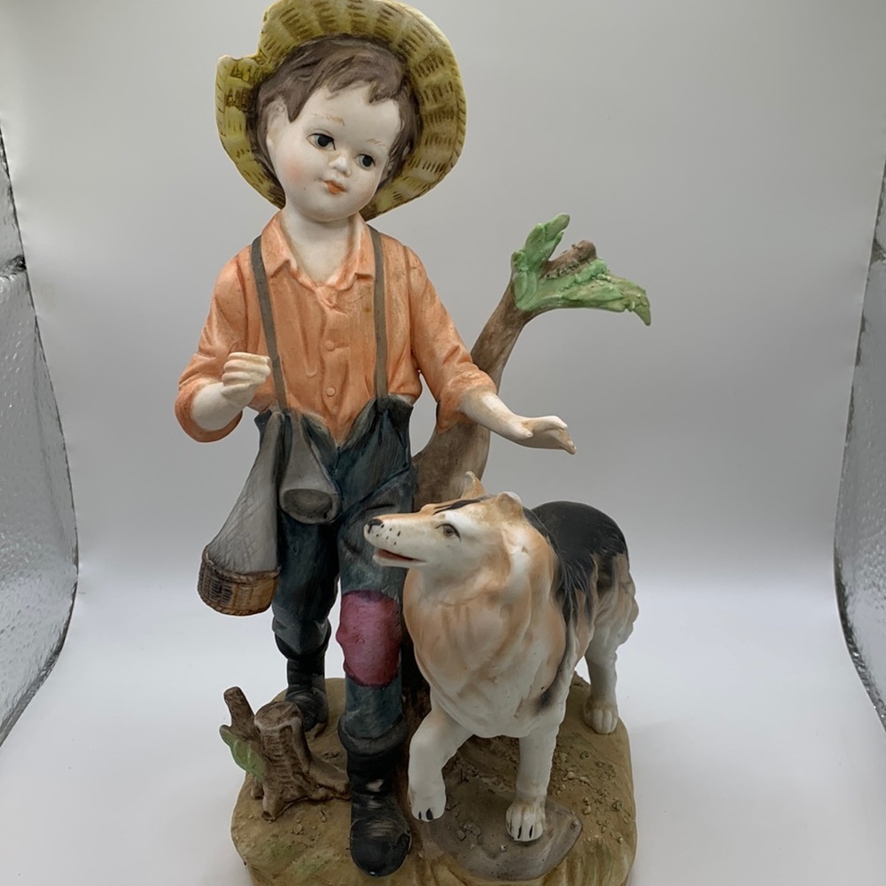 Rare Norleans boy and dog fishing figurine